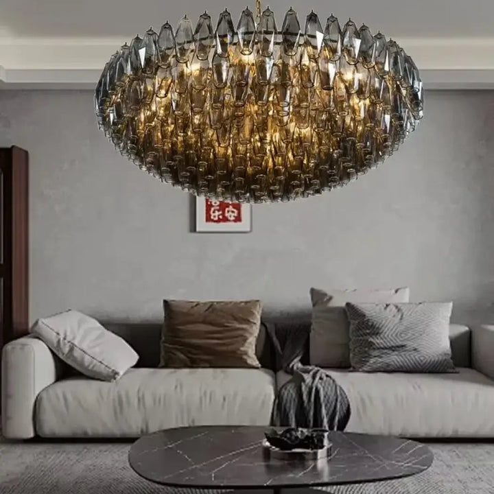 Suspension luminaire murano avec verre sculpté en cristal ambre doré offrant une lumière douce et élégante