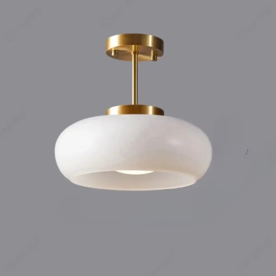 Suspension luminaire melora avec verre teinté aux teintes blanches et structure métal brossé doré moderne