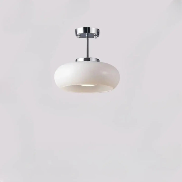 Suspension luminaire melora avec verre teinté aux courbes douces et fixation chrome moderne