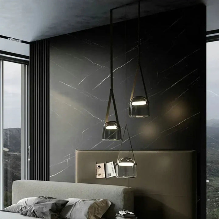 Suspension luminaire en verre teinté gris et à câble noir et original

