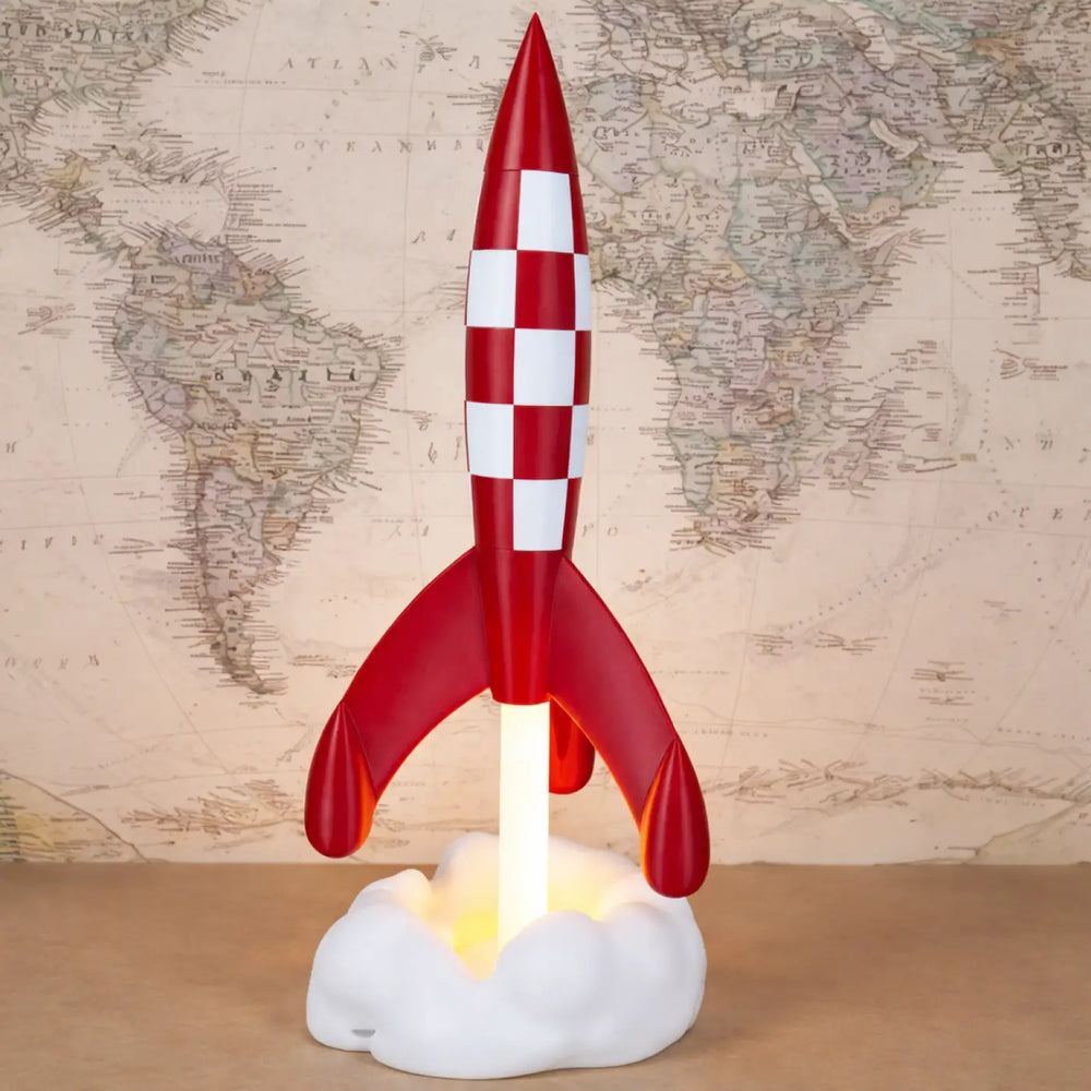 Veilleuse cosmique stellaire en forme de fusée rouge et blanc à carreaux avec base lumineuse pour une ambiance douce