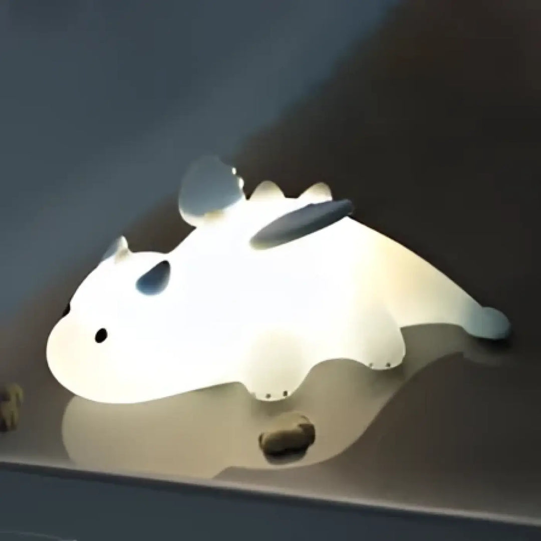 Veilleuse dragon tiamat blanche à lumière douce avec corps en plastique lisse et accents gris subtils sur le dos