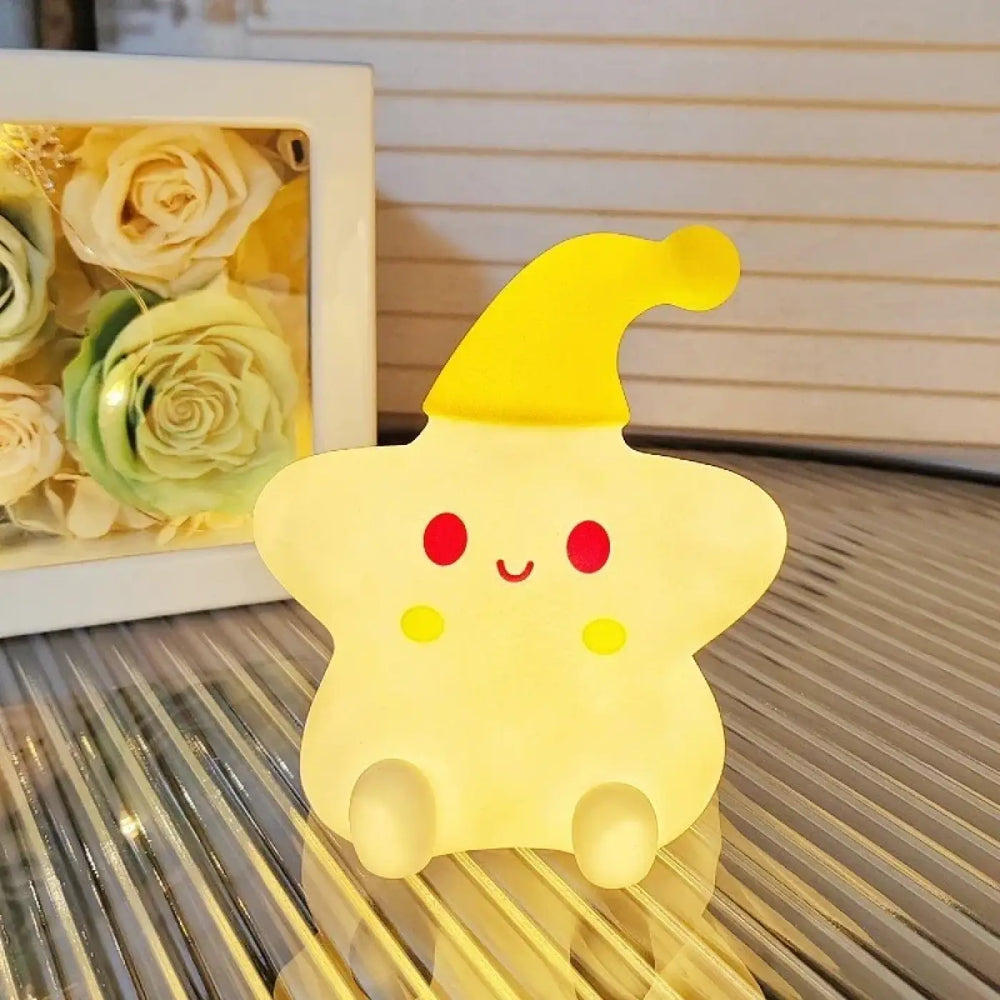 Veilleuse étoile jaune douce en forme d étoile avec visage souriant et chapeau assorti c’est offrir une lumière douce