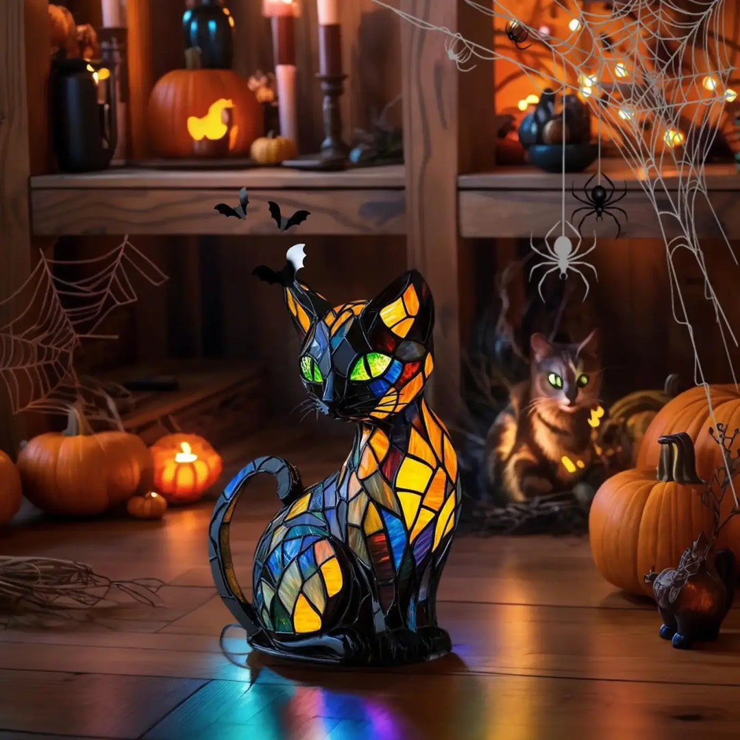 Veilleuse féline en verre coloré avec yeux verts lumineux et motifs mosaïques ambre jaune bleu et orange