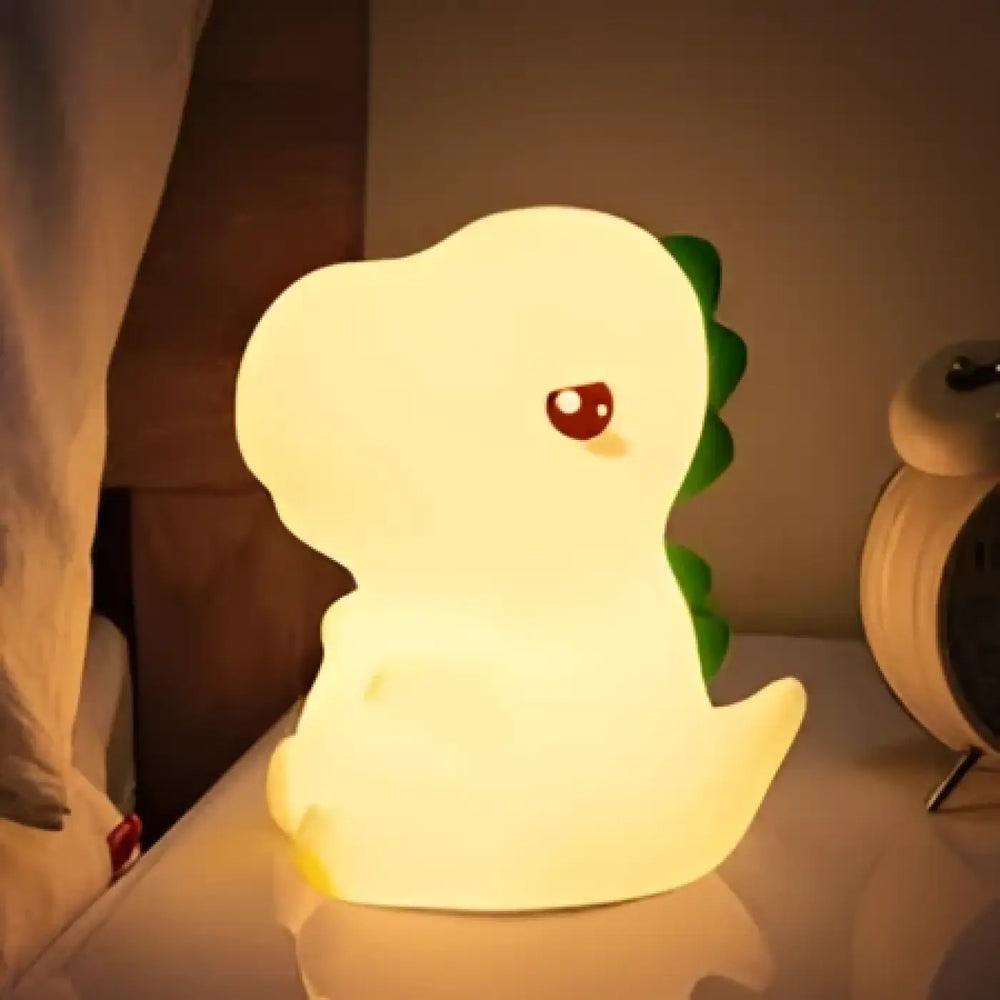 Veilleuse dino dinosaure blanche douce avec épines vertes et yeux rouges lumière douce que les enfants aiment facilite l’endormissement