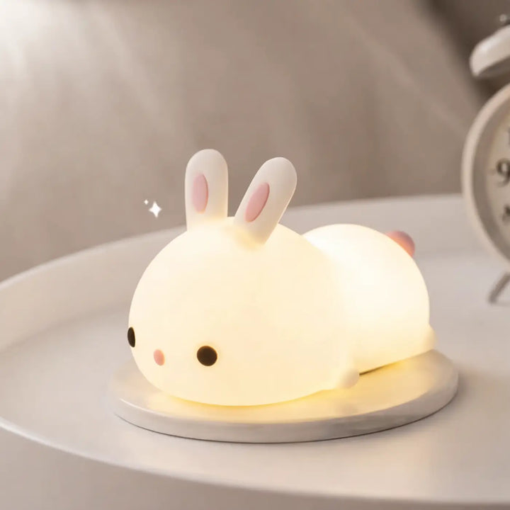 Veilleuse lapin souple blanche douce avec oreilles roses et yeux noirs pour un éclairage d ambiance agréable