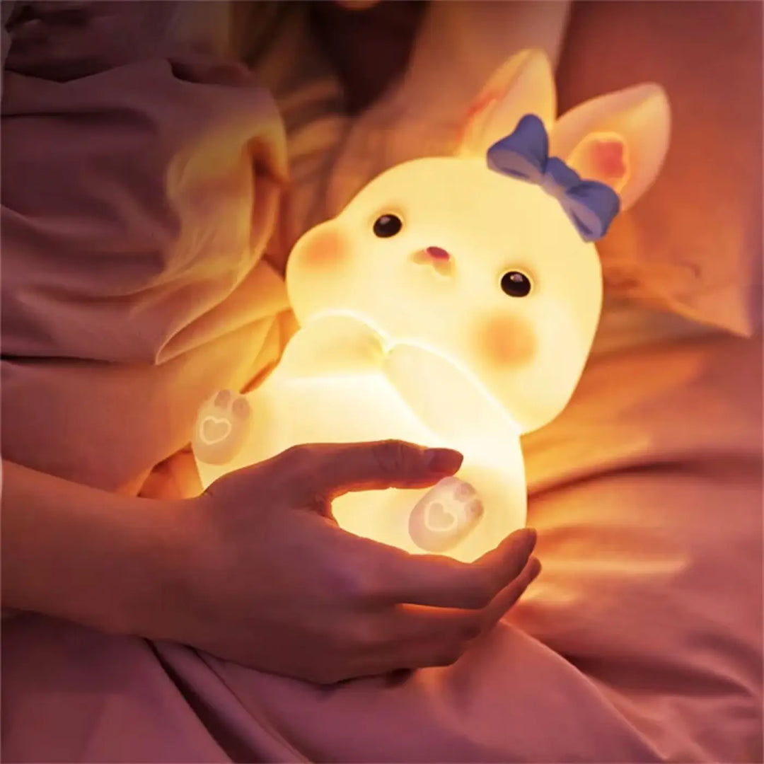 Veilleuse lapin girly ostara douce jaune avec noeud violet et yeux boutons noirs pour éclairage d ambiance