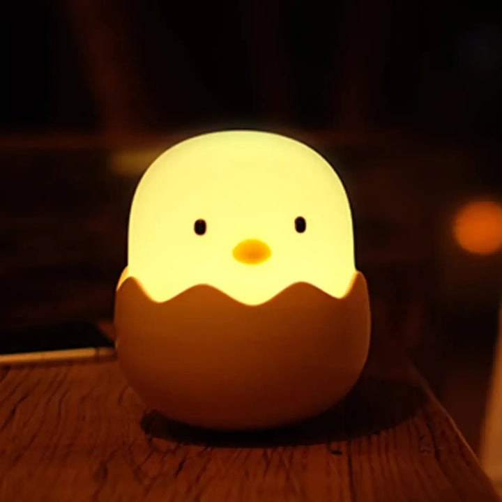 Veilleuse ptibou led douce en forme de poussin jaune doux avec base coquille dœuf marron
