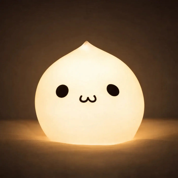 Veilleuse magique en forme de dumpling blanc doux avec touche lumineuse et visage souriant pour lumineuse joue