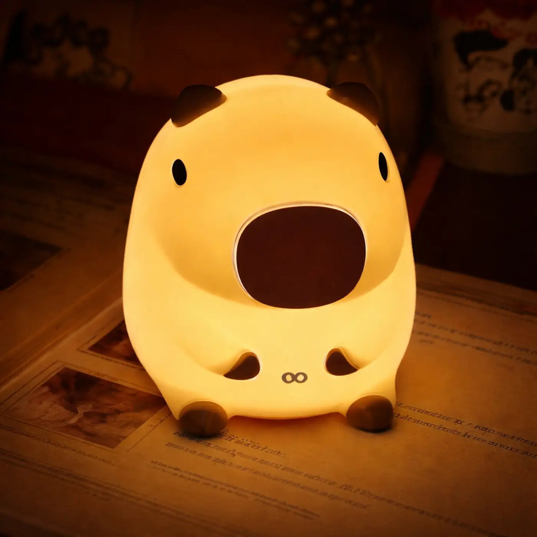 Veilleuse magique animalix jaune doux en forme d animal rond avec touche lumineuse aux oreilles et pattes brunes
