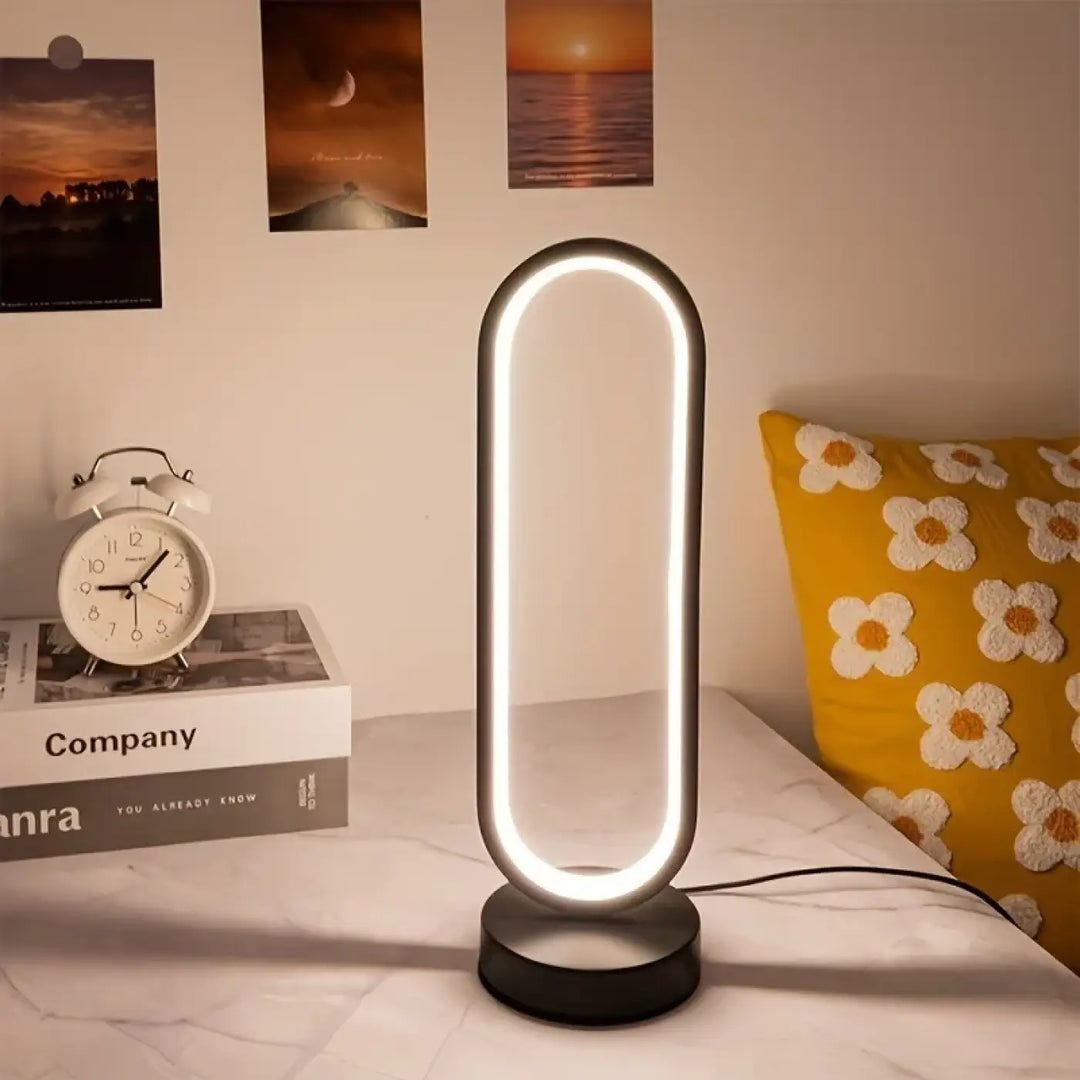 Veilleuse moderne santillana en forme ovale avec lumière led noire en anneau lumineux pour table